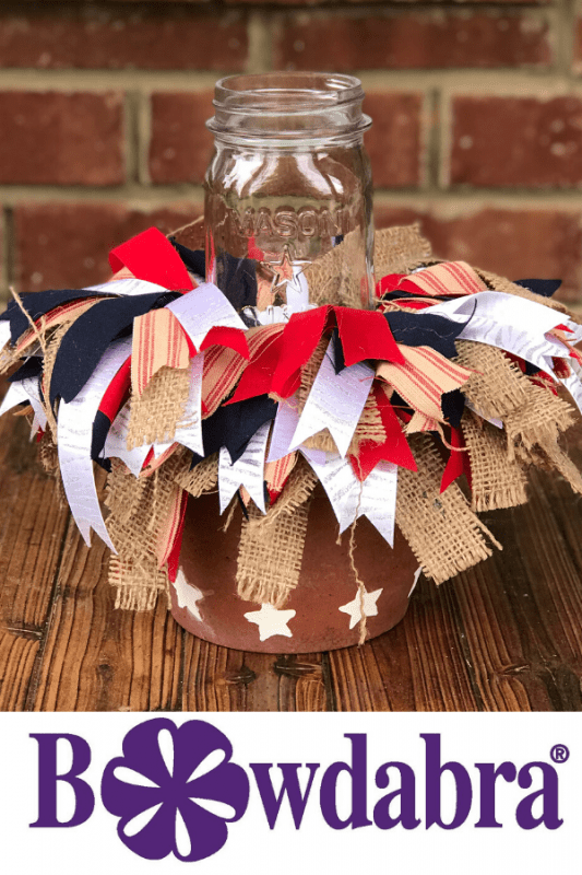Make an easy Summer Outdoor Table Centerpiece. DIY scrappy bows add character and farmhouse flair to this easy centerpiece. #diycenterpiece #diytabledecorations #farmhouse #rustic Make an easy Summer Outdoor Table Centerpiece. DIY scrappy bows add character and farmhouse flair to this easy centerpiece. #diycenterpiece #diytabledecorations #farmhouse #rustic