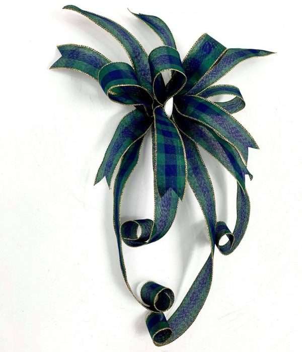 A Modern Deep Blue Bow with multiple tails