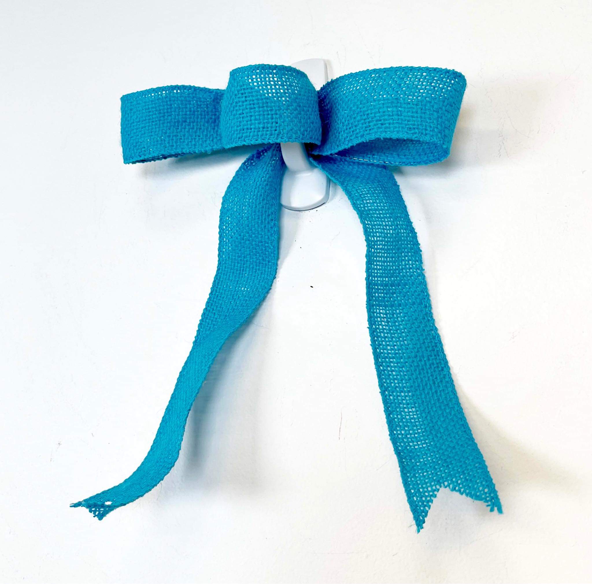 How to make a bow in the Mini Bowdabra on Vimeo