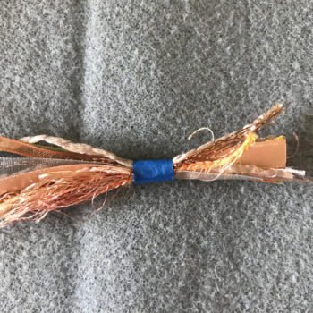 Bundle and Tape One End of Fibers