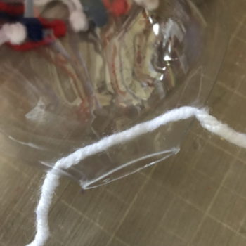 Pass Yarn through Top Holes for Hanging