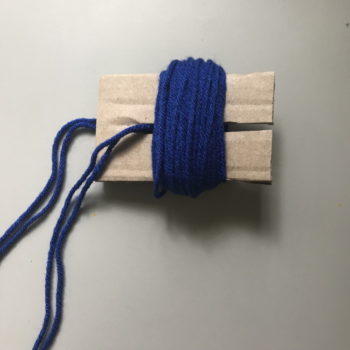 Wrap Yarn Around Pom Pom Maker