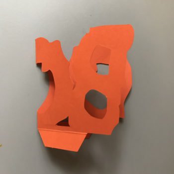 Fold BOO in Half along Vertical Score Line