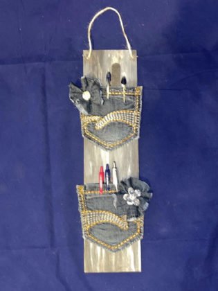 upcycled jeans wall organizer