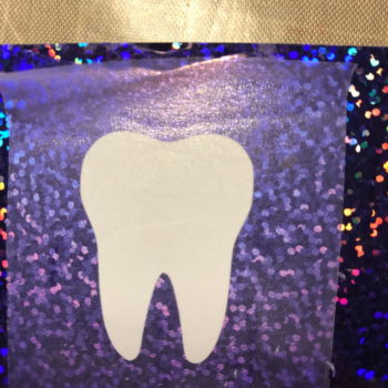 Position Tooth on Bottle Vinyl