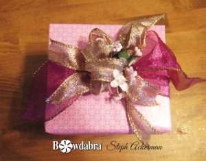 How to make a pretty pink bow for the most attractive gift box