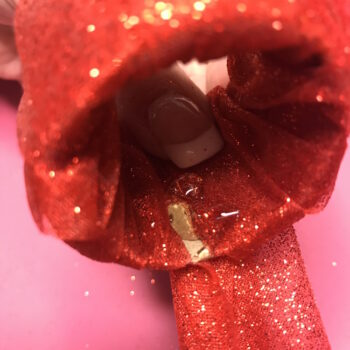 Hot Glue End of Tulle to Inside of Roll