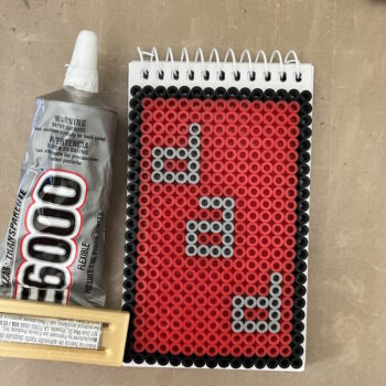 Glue Perler Bead Design to Notebook
