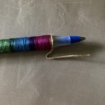 Wrap Floss to Top of Pen