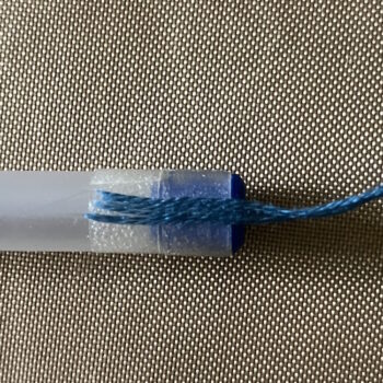 Position Beginning Tail of Floss on Taped Pen