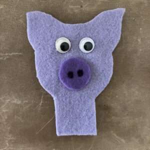 Glue Nose and Eyes on Pig Felt Finger Puppet