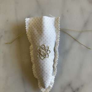 Lay Filled Sachet on a Folded Length of Bow Wire