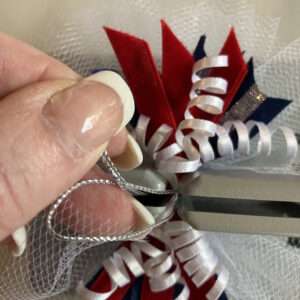 Pass Bow Wire Ends through Loop