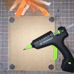 Secure Hanging Ribbon and Glue Magnets to Back Corners of the Magnetic Locker Mirror