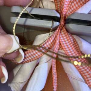 Pass Bow Wire Ends through Loop