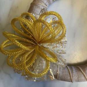 Fluff the Bow and Tie onto Wreath