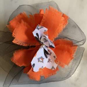 Fluff and Arrange Ribbons on the Bow for the Witch Hats