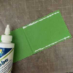 Apply Bead of Glue to Edges of Trick or Treat Bag